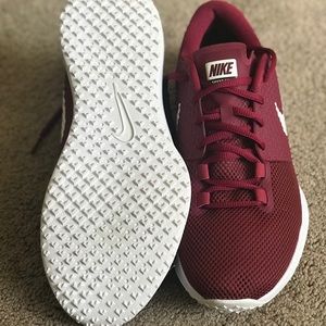 Maroon Nike sneakers
